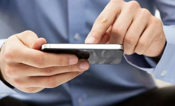 Young adult using a smart phone